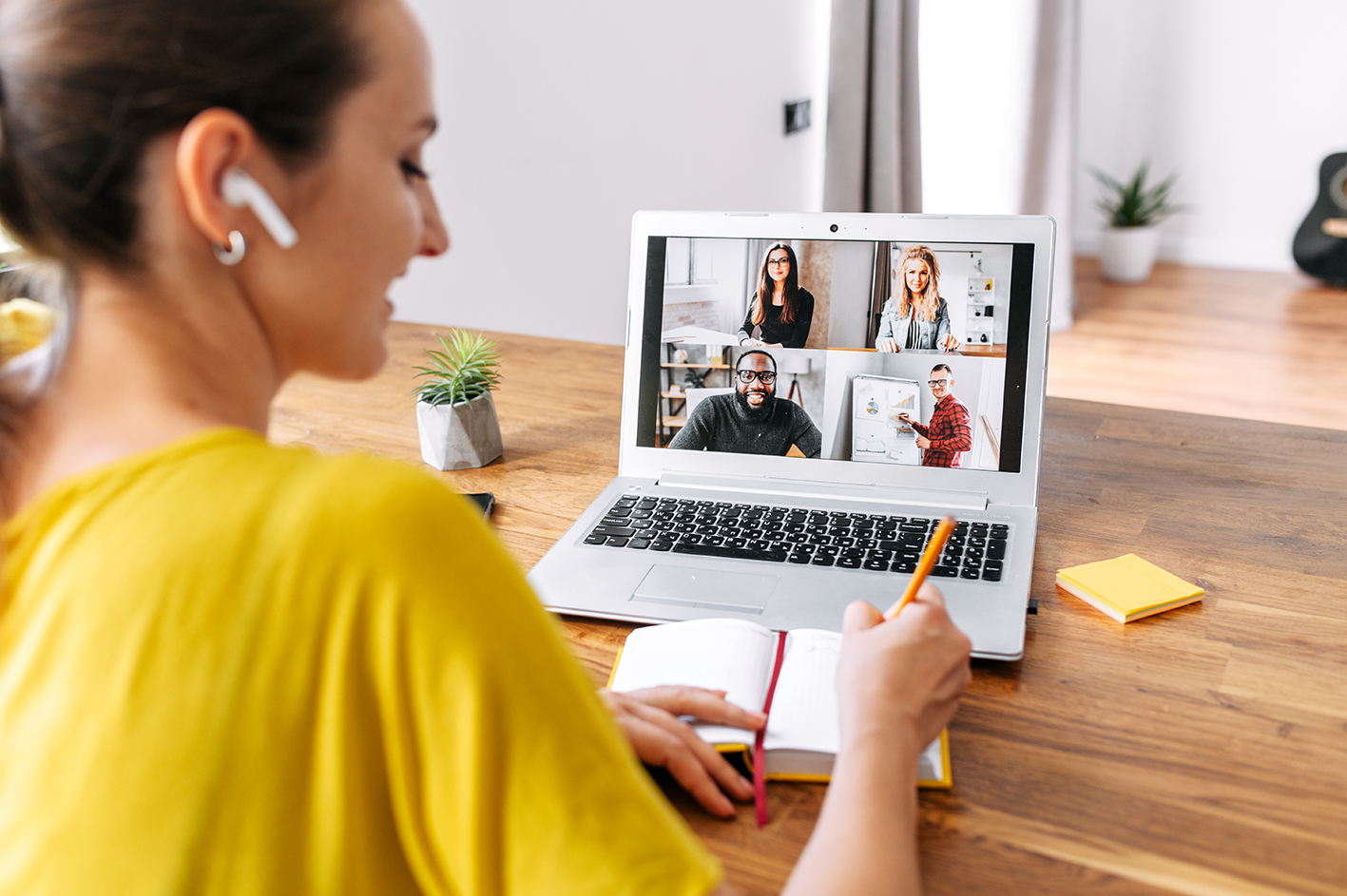 woman-uses-laptop-for-video-call-indoor